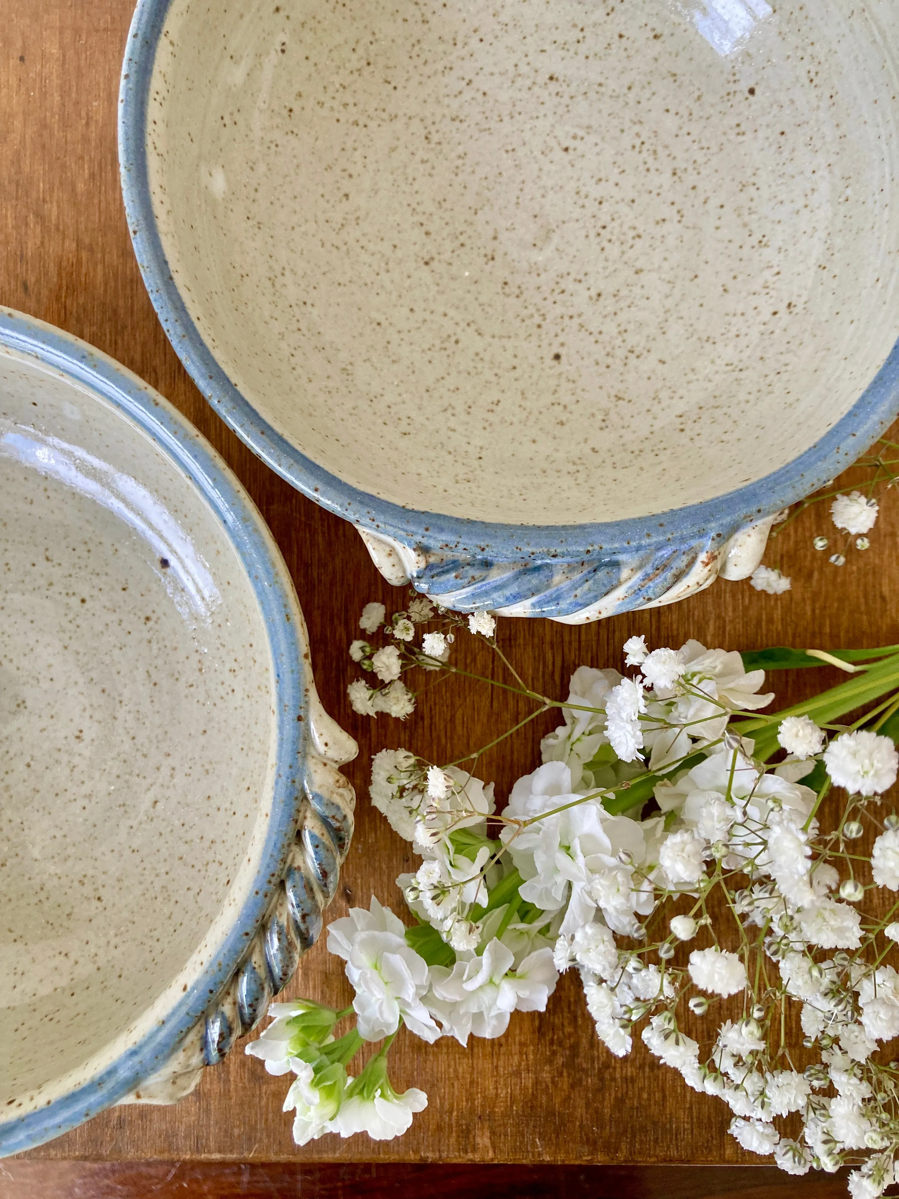 A pair of stoneware studio pottery bowls